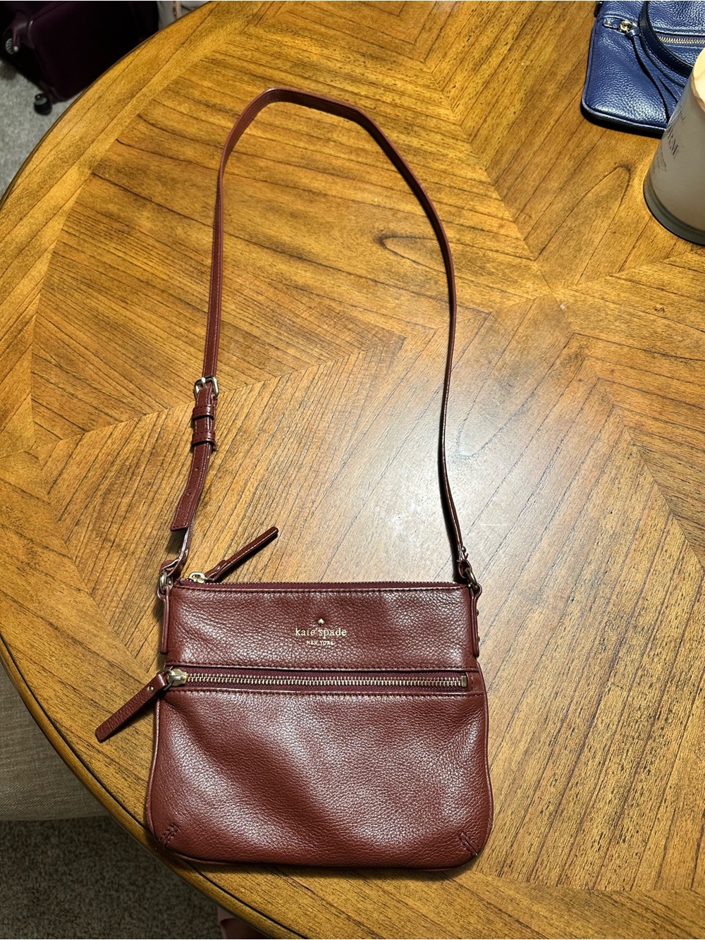 kate spade Pebbled Leather Crossbody in Burgundy